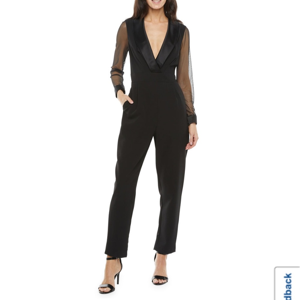 Eliza J black jumpsuit with mesh sleeves. Size 6